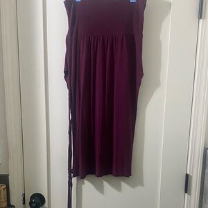 Sleeveless Burgundy skirt high slit sexy